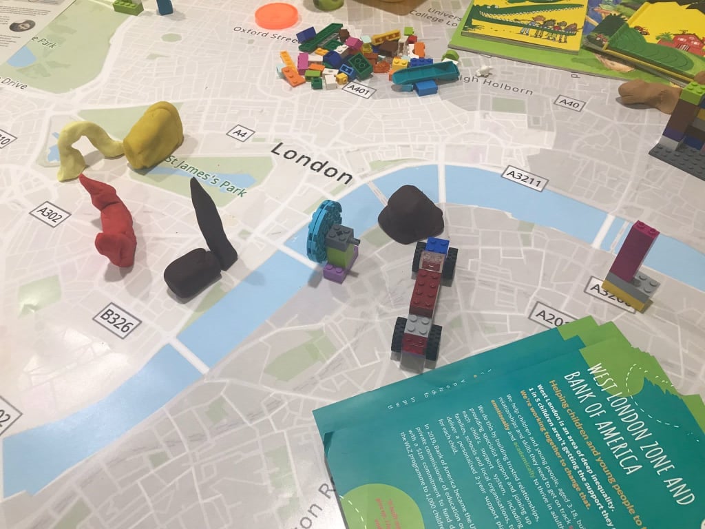 LEGO and Play-Doh models of London landmarks on a map of London
